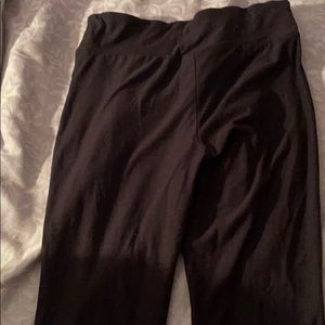 Black tights. Open at the bottom.